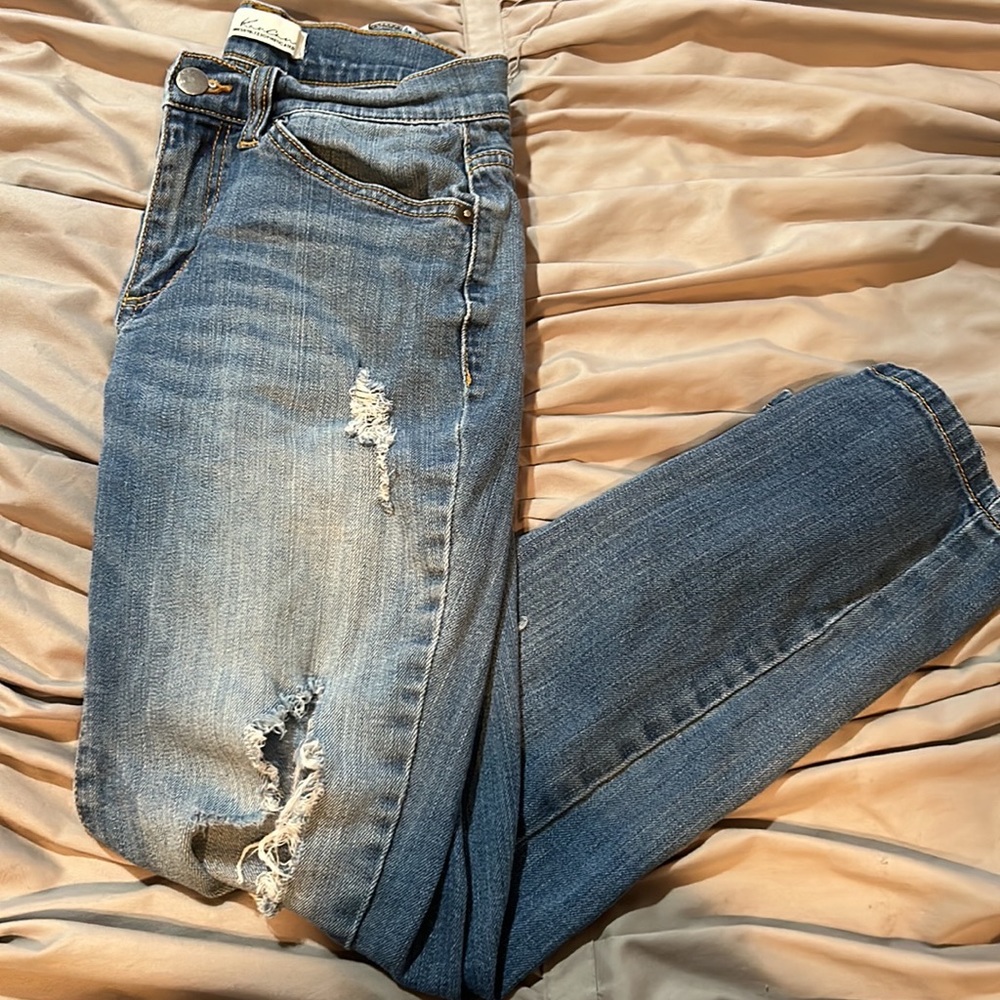 Ripped Straight Legged Skinny Jeans